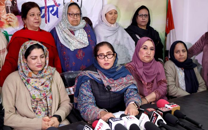 J&K Mahila Congress President Shameema Raina addressing a press conference in Srinagar. -Excelsior/Shakeel