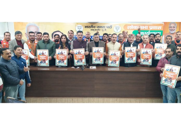 BJP leaders releasing poster highlighting Modi Government’s welfare schemes for OBCs at Jammu on Saturday.