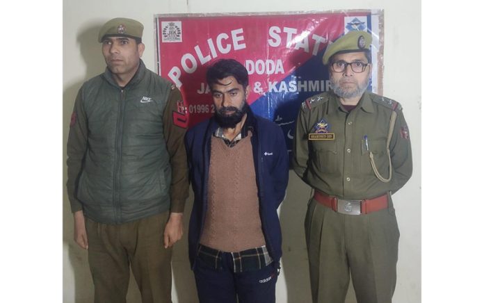 Cops at Police Station Doda present the absconder arrested after 28 years.