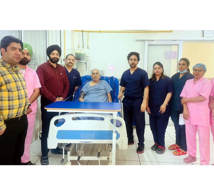 A team of doctors led by cardiologist Dr. Najmus Saqib Shah posing after successfully performing a case of IVL in Jammu on Wednesday.