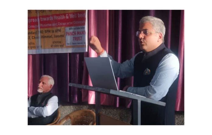 An expert delivering a health talk at Panch Mandir complex, Channi Himmat in Jammu.