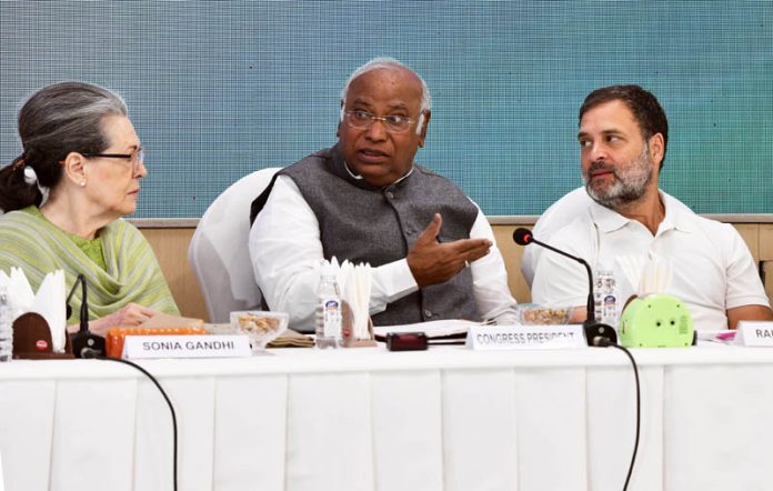 Congress president Mallikarjun Kharge with party leaders Sonia Gandhi and Rahul Gandhi at the CWC meeting at AICC headquarters in New Delhi on Tuesday. (UNI)