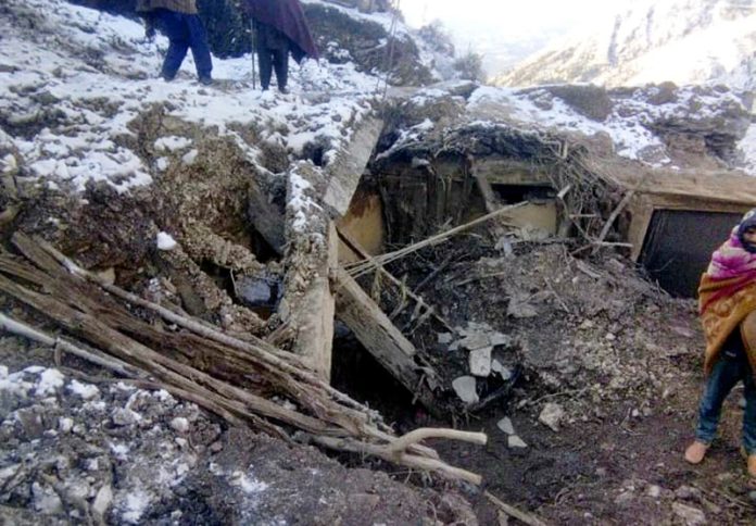 A view of house collapse in which four members of a family were killed in Reasi. -Excelsior/ Romesh Mengi