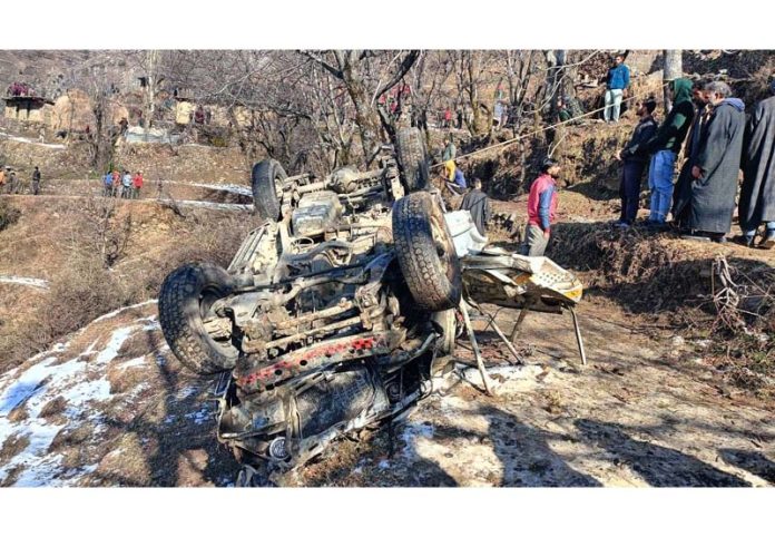 Mingled remains of the ill fated vehicle after accident in Ramban on Monday.