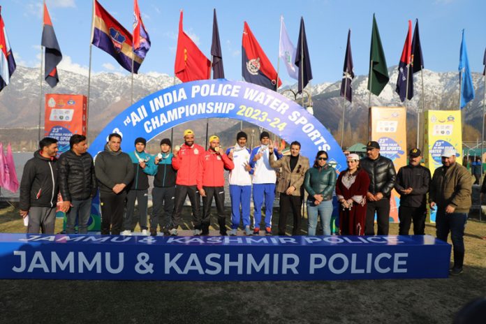 Water Sports athletes displaying medals while posing during prize distribution ceremony at Srinagar on Monday.