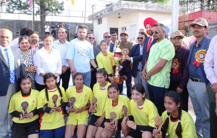 Winning team posing with dignitaries during closing ceremony at Jammu on Sunday.