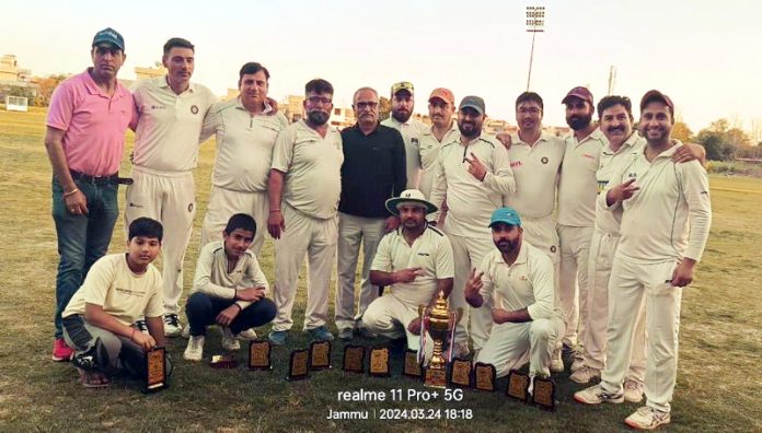 Kashyap Cricket Club posing with the trophy at Jammu.