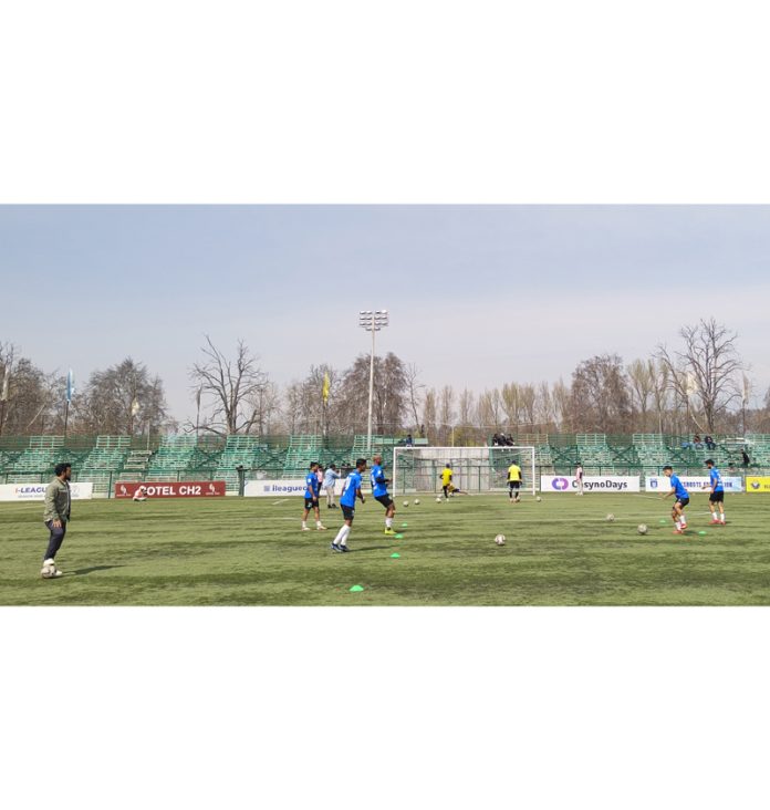 Football players during a practice session in Srinagar on Friday.