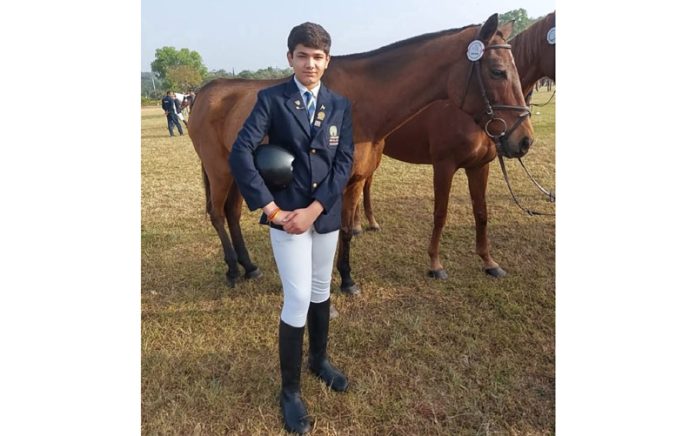 Rachit posing with his Horse during practice session.