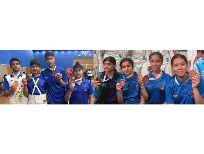 J&K Boys (left) Girls (right) posing with medals during 25th Sub Junior National Fencing Championship. 