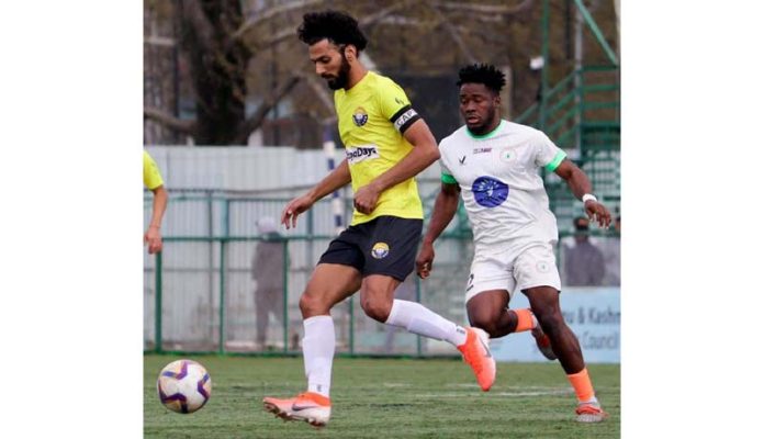 Football players in action during a I-League match at Srinagar on Saturday.