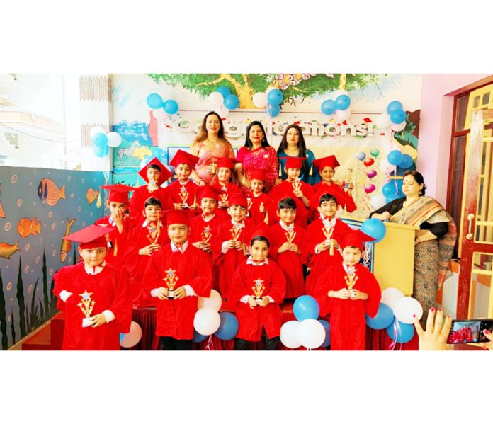 Students posing with teachers during a programme in school on Friday. 