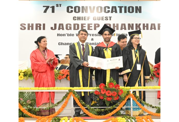 Abhishek Bharti getting his Ph.D. during the 71st Annual Convocation of Punjab University on Monday.