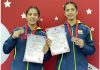 Wushu Sisters, Ansa Chishti and Ayeera Chishti Great posing with medals and certificates.