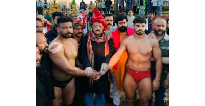 Senior BJP Leader Devender Singh Rana introducing wrestlers before the bout at Nagrota.