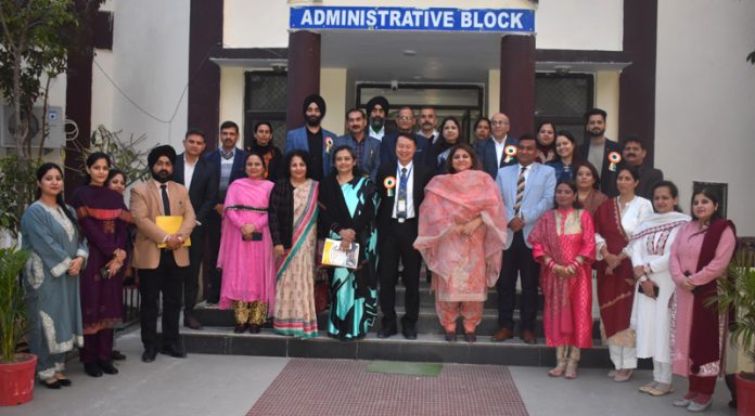 Keynote speaker along with faculty members of different Colleges posing for group photograph during two day long International Conference at Kathua on Wednesday.