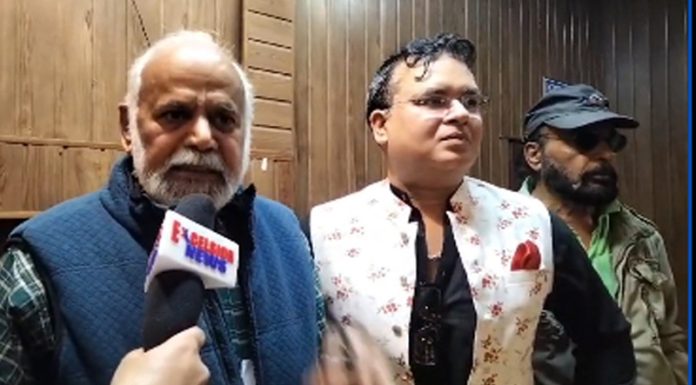 Veteran artist Janak Khajuria talking to reporters at Jammu on Wednesday.