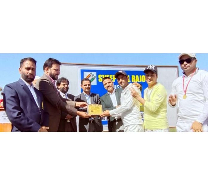 Chief Guest presenting trophy to winning team at Rajouri on Saturday.