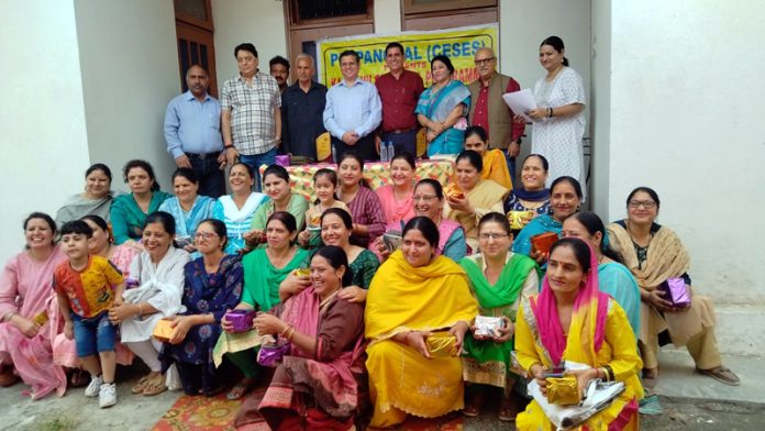 Relief and Rehabilitation Commissioner, Dr Arvind Karwani with displaced Women Entrepreneurs during a function at Jammu on Friday.