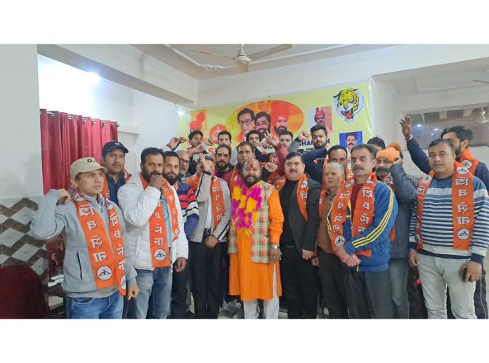 Senior leaders of Shiv Sena posing with new entrants of the Party at Udhampur.