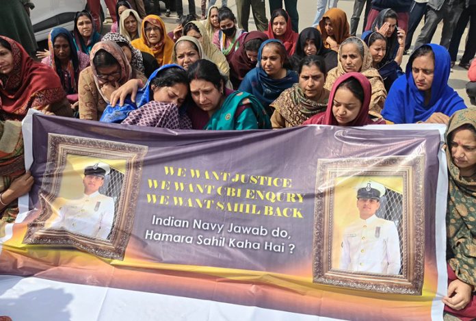 The family members and relatives of missing Indian Navy sailor Sahil Verma protesting in Jammu on Wednesday.