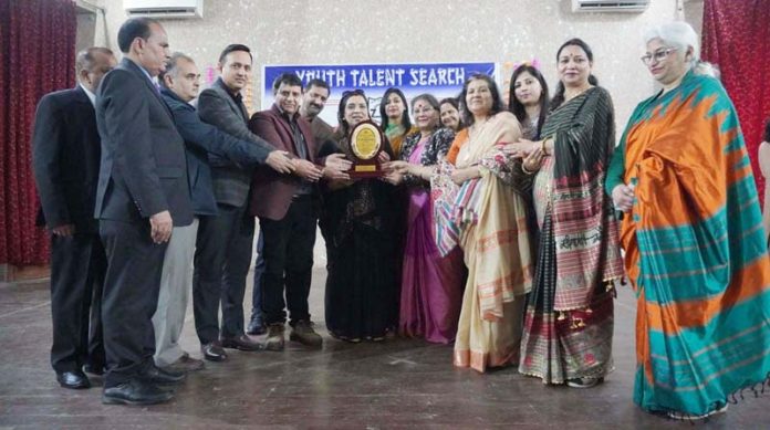 Dignitaries presenting memento to Chief Guest Dr Ritu Singh during a programme at Jammu.