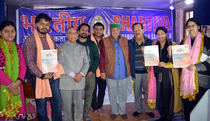 BLSKS artists posing with certificates during a function at Jammu on Friday.