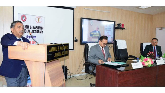 Justice Sanjeev Kumar addressing staff members of Court during a programme on Saturday.