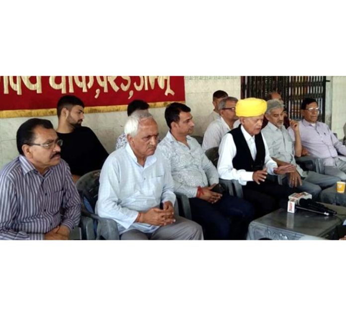 DBPS President Ved Parkash Sharma addressing media persons in Jammu on Saturday.