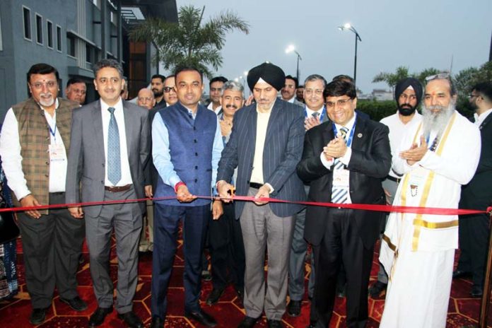 Dignitaries cutting the traditional ribbon to inaugurate PackTech Asia exhibition in Jammu on Thursday.-Excelsior/Rakesh