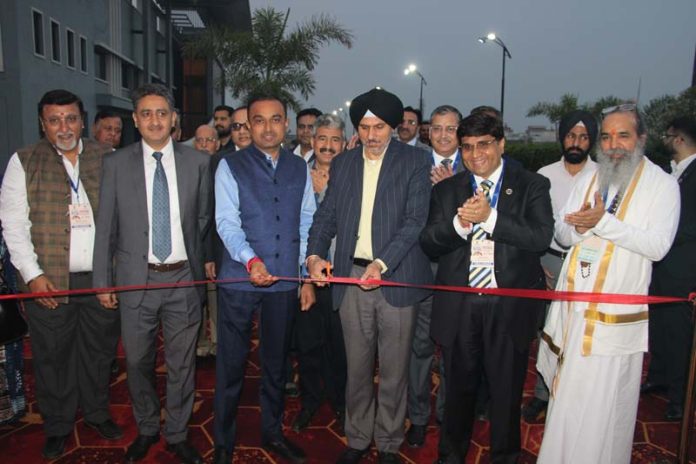Dignitaries cutting the traditional ribbon to inaugurate PackTech Asia exhibition in Jammu on Thursday. -Excelsior/Rakesh
