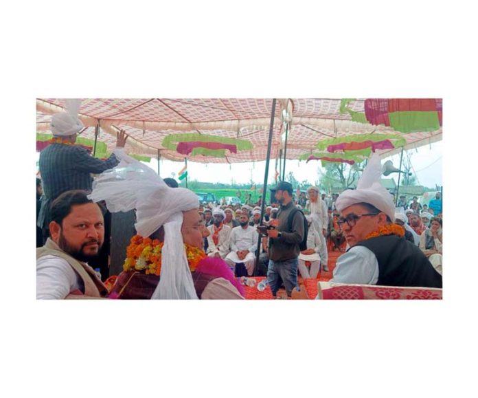 MP (RS) Ghulam Ali Khatana addressing a conference of Gujjars and Bakerwals at Bhagthali, Kathua on Thursday.