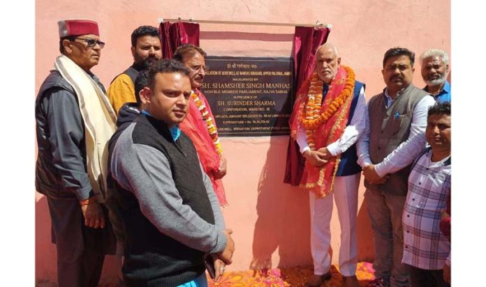 Ex MP and senior BJP leader, Shamsher Singh Manhas and ex councilor, Surinder Sharma inaugurating tube-well at Paloura on Saturday.