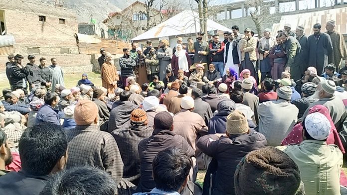 People in Kangan stage protest against hike in electricity tariff. - Excelsior/Firdous