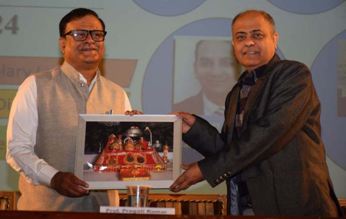 SMVDU Vice-Chancellor being presented memento during the Management Conclave by Business School.