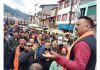 A man addressing protesters in Bhaderwah during a protest against rash driving. - Excelsior/Tilak Raj
