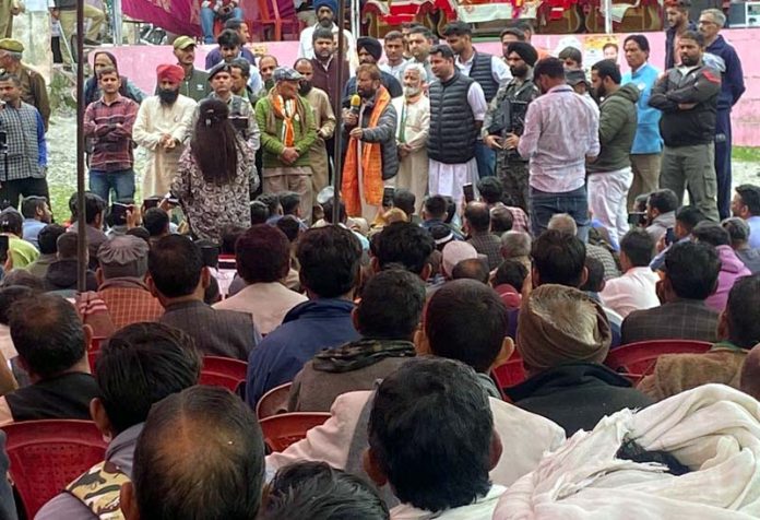 Ch Lal Singh addressing a public gathering in Bani.