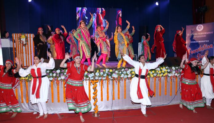 Cluster University students presenting a folk dance during Foundation Day celebration.