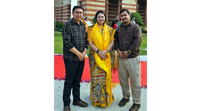 MP Ladakh JTN and BJP district president Kargil, M A Chandan posing with Union Minister of State for External Affairs and Culture, Meenakshi Lekhi after their meeting with latter at New Delhi on Friday.