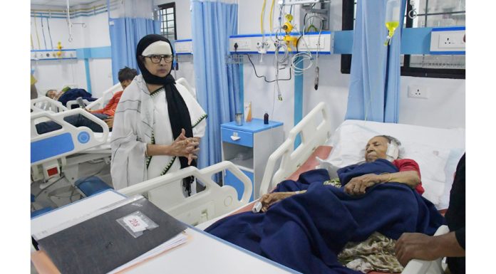 West Bengal Chief Minister Mamata Banerjee visits people who were injured after an under-construction building collapsed on Sunday night, at a hospital in Kolkata on Monday. (UNI)