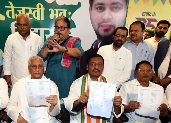 Bihar RJD president Jagdanand Singh along with Bihar Congress president Akhilesh Singh release I.N.D.I.A Alliance candidates lists for Lok Sabha election at a press conference, in Patna on Friday. (UNI )