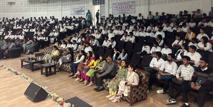 Dignitaries and students participating in an awareness program conducted by J&K Bank in Jammu on Friday.