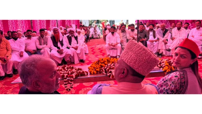 MP, Ghulam Ali Khatana addressing a group of prominent Muslims at Bhatindi on Sunday. BJP district president Rekha Mahajan is also seen in the picture.
