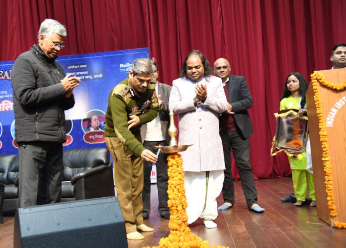 DGP of J&K Police, R R Swain lighting ceremonial lamp to inaugurate Empyrean 2024 at IIM Jammu.