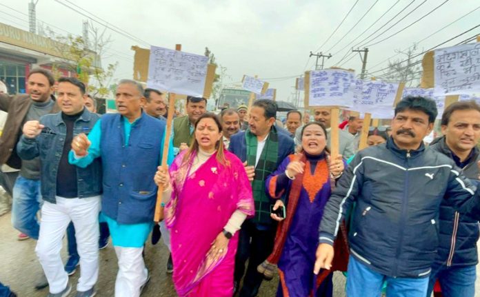 BJP activists holding protest at Jammu on Friday.