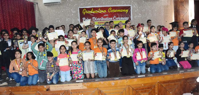 Winners of Speed Maths Competition posing with their certificates.