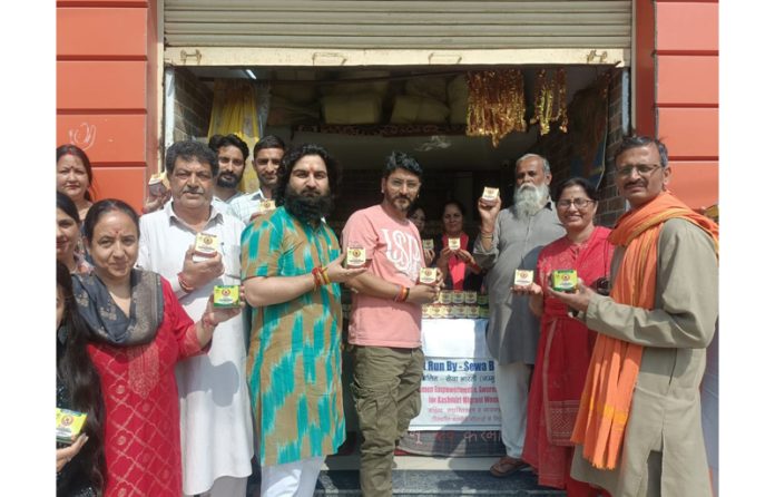 Representatives of Sewa Bharti and social activists unveiling the handmade Glycerine soap at Jagti Township on Friday.