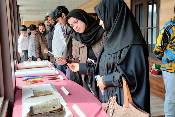 Participants during INTACH’s workshop on manuscript preservation in Srinagar on Wednesday. - Excelsior/Shakeel