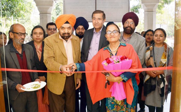 A dignitary cutting the traditional ribbon to start a national exhibition in Amritsar on Monday.