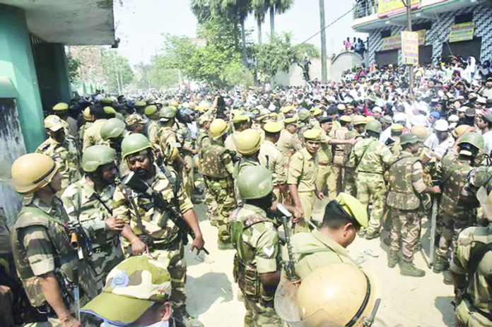 Security personnel deployed at the residence of the gangster-turned-politician Mukhtar Ansari during his funeral at Mohammadabad, in Ghazipur district.
